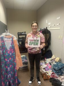 Danielle Lawrence stands in Thrifty Threads thrift store.